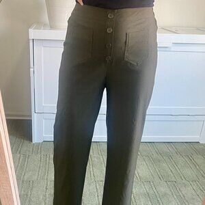 Olive green straight leg pant with decorative buttons on front